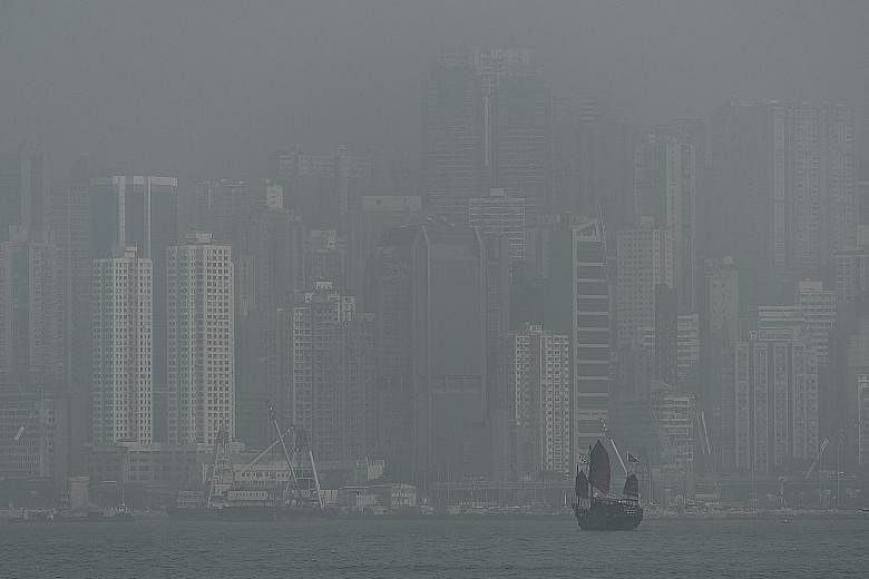 Air pollution in Hong Kong in January last year. Researchers tracked more than 66,000 people over the age of 65 in Hong Kong between 1998 and 2011, using satellite data and fixed-site monitors to estimate the concentration of hazardous PM2.5 particle