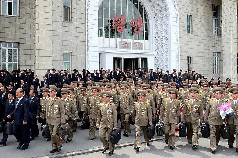 In this photo released by the North's official Korean Central News Agency, participants are seen arriving in Pyongyang for the ruling Workers' Party's first congress in 36 years, which kicks off on Friday. South Korea's defence minister has voiced co