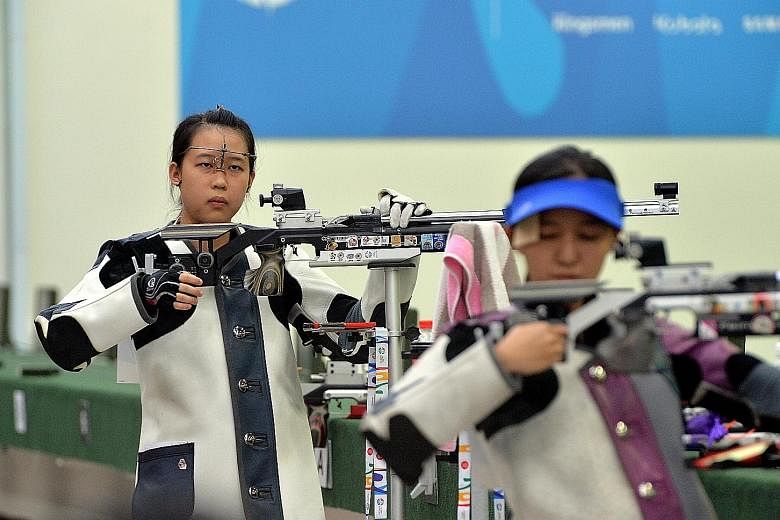 Tessa Neo (above), Martina Veloso and Adele Tan had a combined total score of 1,236.6 in the 10m air rifle which won them bronze.