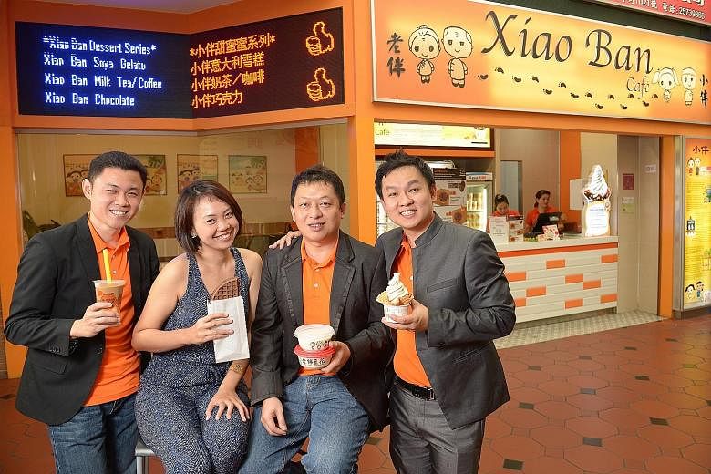 Tai Sei Hei's management staff comprising (from left) Mr Max Yeow, Ms Esther Yan, Mr Ken Li and Mr Terrence Hong. Mr Yeow credits IE Singapore for steering the company - which produces soya beancurd under the brand Lao Ban - towards Vietnam. It has a