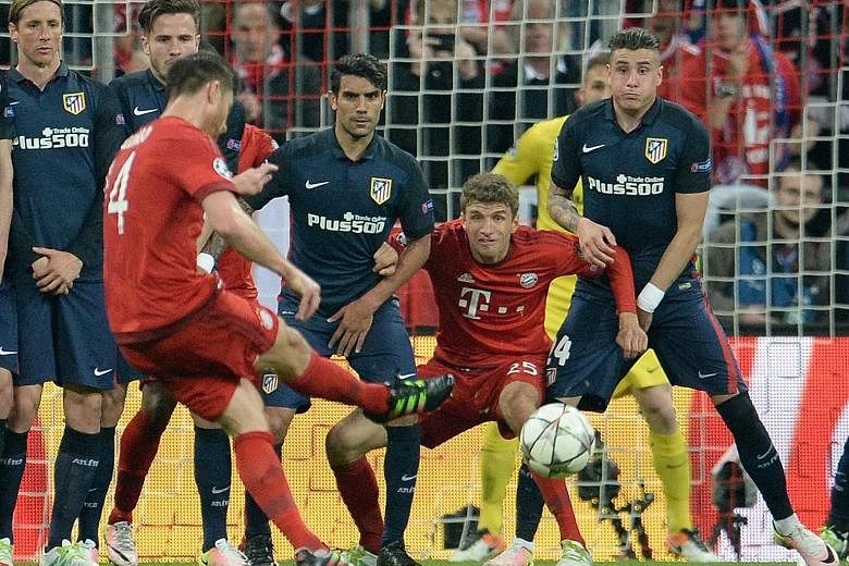 Bayern Munich's Xabi Alonso opened the scoring with a free kick, after the flight of the Spanish midfielder's shot was altered by a deflection off Atletico Madrid defender Jose Gimenez. Atletico forward Antoine Griezmann equalised with a valuable awa