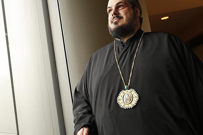 Metropolitan Konstantinos Tsilis, 44, was a print and radio journalist for 15 years before he became a priest.