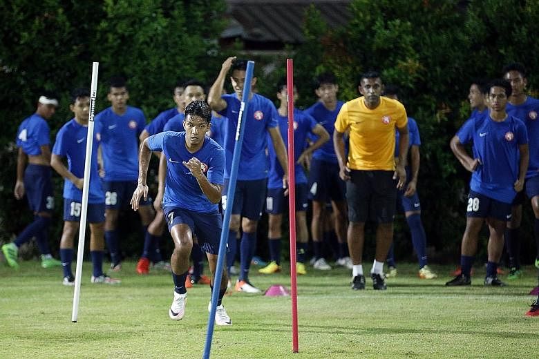 Garena Young Lions forward Fareez Farhan, foreground, who has scored all of his side's goals so far, is looking forward to the return of captain Khairul Amri to spearhead their attack in the rest of this S-League season.