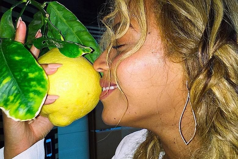 Beyonce (left) posted photos that hinted at the album Lemonade months before she released it.