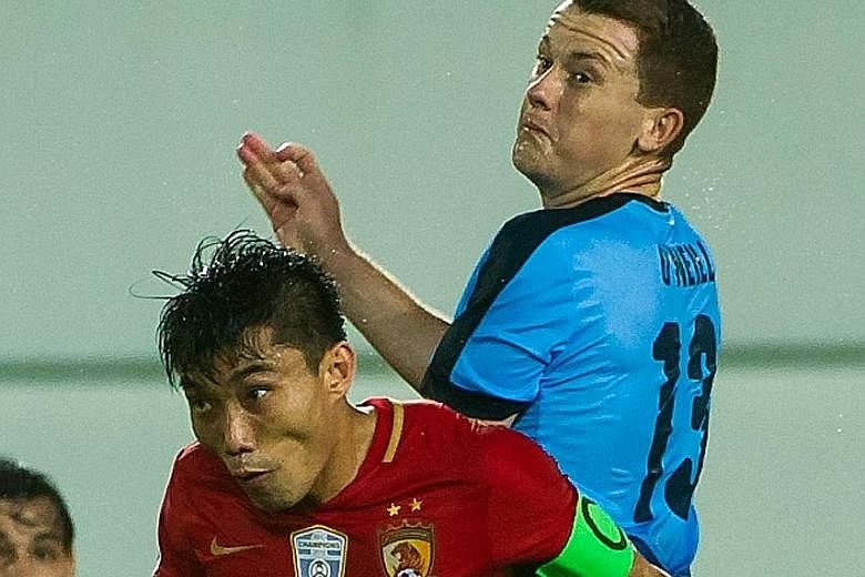 Zheng Zhi (left, with Brandon O'Neill) and his big-spending Guangzhou Evergrande side were already knocked out of the AFC Champions League before this 1-0 Group H home win over Sydney FC.