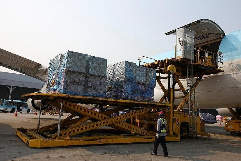 Cargo being unloaded from a Korean Air Lines freight plane. Asia-Pacific carriers reported a 5.2 per cent year-on-year drop in volume for March. Iata chief executive Tony Tyler said: "It's shaping up to be another tough year for air cargo."