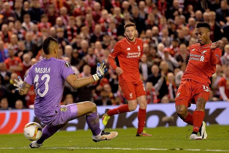 Liverpool's Daniel Sturridge slotting home the decisive second goal against Villarreal on Thursday. The Reds claimed a 3-1 aggregate Europa League semi-final win that put them in their second final under Juergen Klopp.