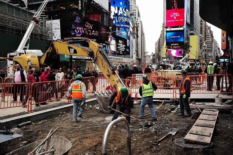 A construction site in New York City. The US Labour Department yesterday said gains in construction employment slowed sharply last month, with the sector adding 1,000 jobs, after home building showed some signs of fatigue.