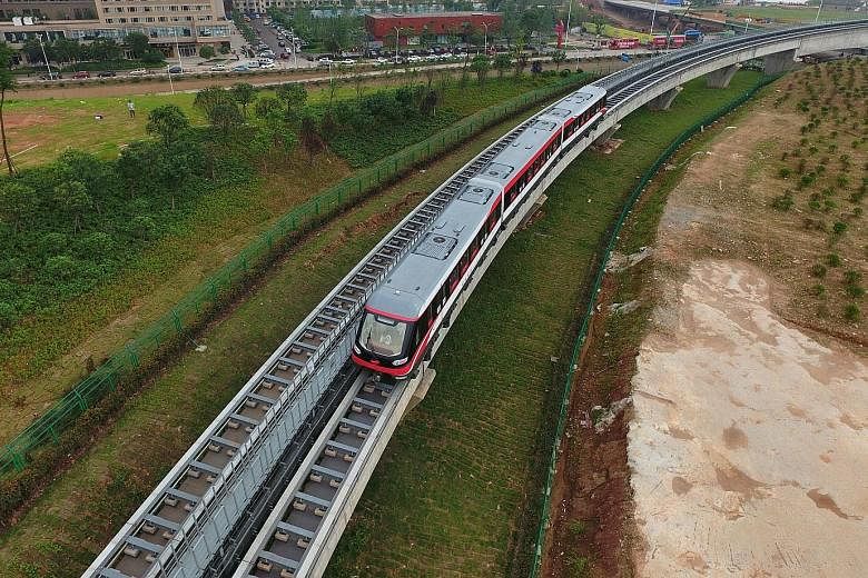 The magnetic levitation train, with a maximum speed of 100kmh, began ferrying passengers on the 18.5km-long line in the city of Changsha yesterday.
