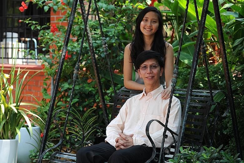 Dr Richard Kwok (seated), with his daughter Kwok Fuyu. Dr Kwok was regarded as stupid in school, but discovered he was dyslexic later in life. He is now Chief Technology Officer at Singapore Technologies Kinetics.