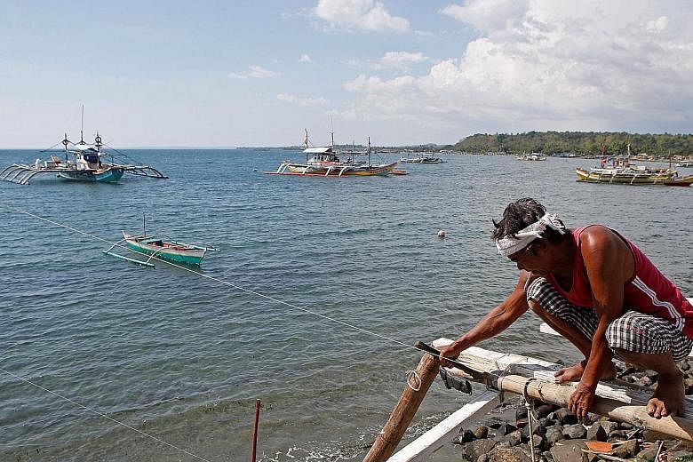 Filipino fishermen from coastal communities around Masinloc in Zambales province rely heavily on the disputed Scarborough Shoal in the South China Sea for their catch and livelihood.