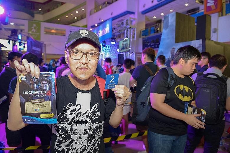 A countdown in more ways than one. As gaming enthusiasts count down to the launch of Uncharted 4 on Monday night, Funan DigitaLife Mall is also counting down to when its shutters fall for the last time in July. Freelance writer Darren Chew, 38 (left)