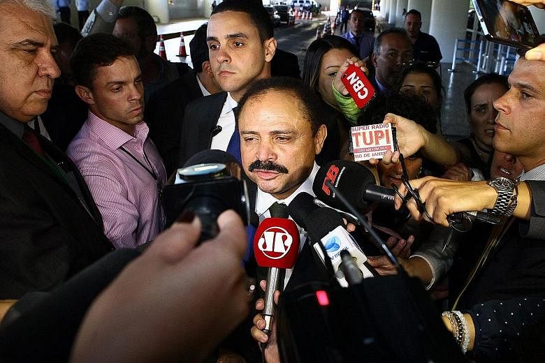 Mr Maranhao meeting the press after annulling the impeachment process on Monday. He changed his mind yesterday.