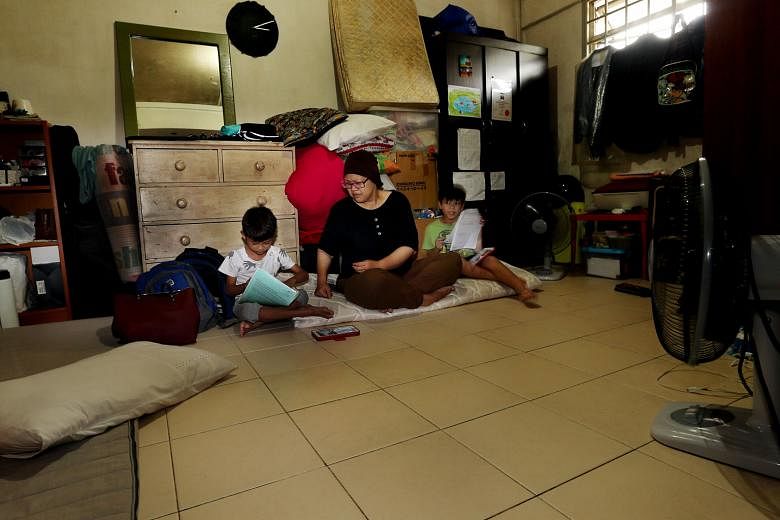 Ms Renemarlina and her two children went from living in a three-room flat to staying in her parents' rental flat after she got divorced. She is currently looking for a job and intends to buy a Housing Board flat once she can afford one. 