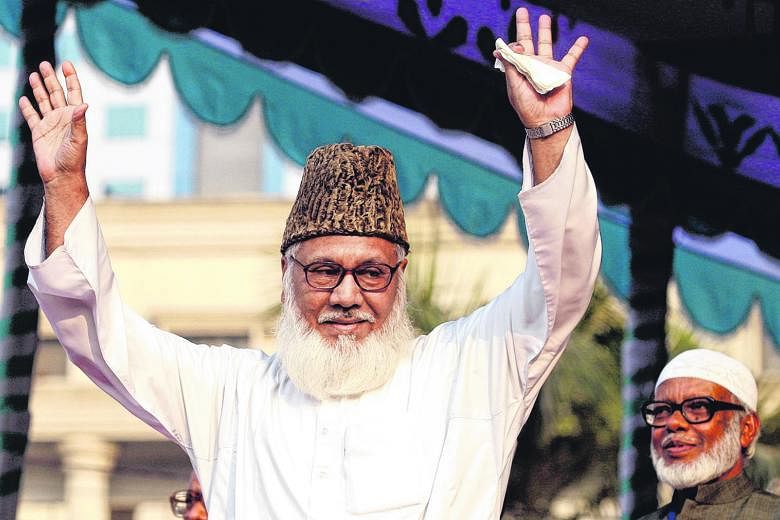 Nizami waving to his supporters during a rally in Dhaka in February 2006. He was hanged yesterday after being found guilty of eight charges, including genocide, torture and rape during the 1971 Liberation war with Pakistan.