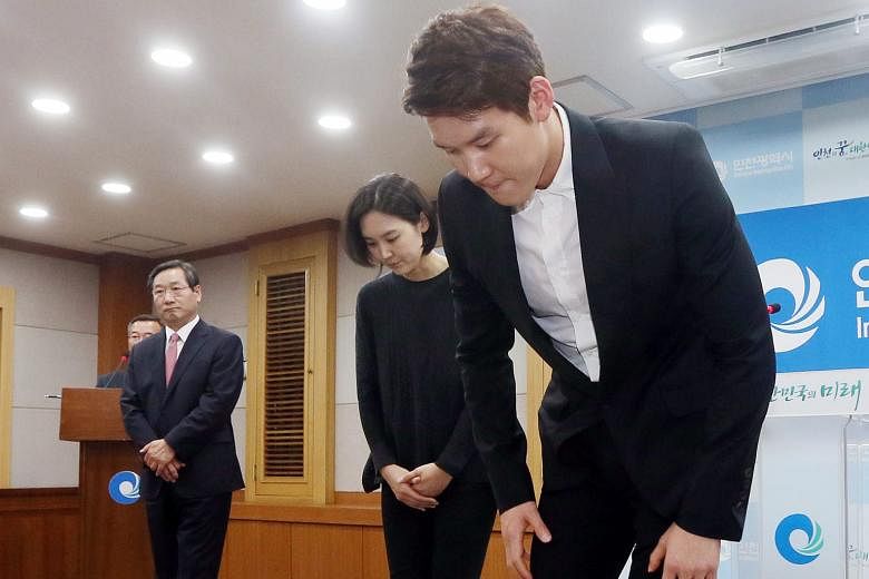 South Korea's 2008 Olympic swimming champion Park Tae Hwan bows at the Incheon City Hall on May 2 while apologising for doping. He has been omitted from the Korea Swimming Federation's preliminary list of athletes for the Rio Olympics. 