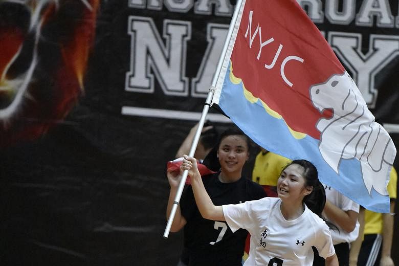 (Above) Players from the Nanyang Junior College girls' team doing a victory lap around the Toa Payoh Sports Hall. 