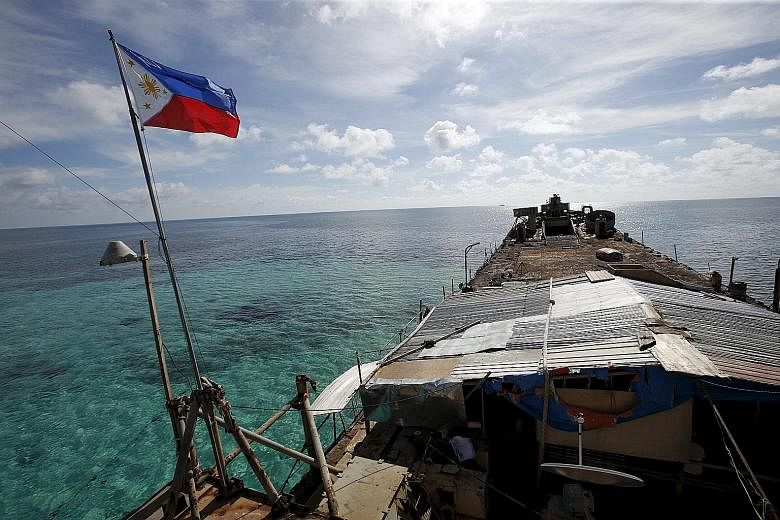 A 2014 file photo showing the BRP Sierra Madre, a dilapidated Philippine Navy ship that was run aground atop the Second Thomas Shoal in the Spratly Islands in 1999, in a bid by Manila to check the advance of Beijing in the South China Sea. The South 