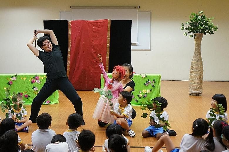 Paper Monkey Theatre conducting a performance at a kindergarten last year as part of the NAC-Arts Education Programme.