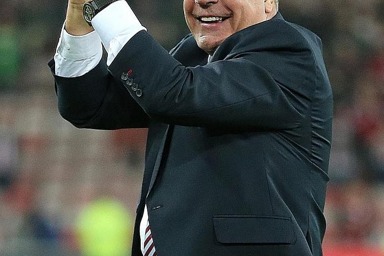 Sunderland manager Sam Allardyce acknowledges fans after the game.