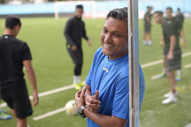 Tampines Rovers coach Sundram is all smiles at a training session with his team at the Jalan Besar Stadium. He has emerged as one of the front runners for the national job vacated by Bernd Stange last month.