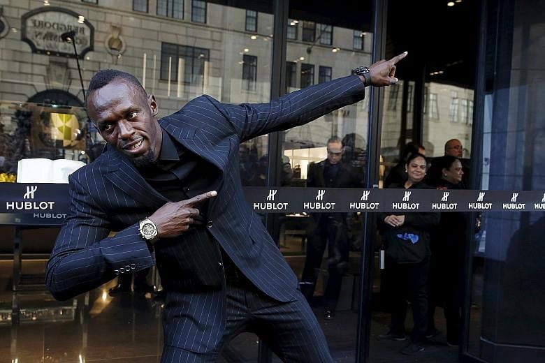 Usain Bolt, seen here at the opening of the flagship Hublot store in Manhattan, will make his 2016 track debut today in the Cayman Islands to gauge his preparation for the Rio Games in August.