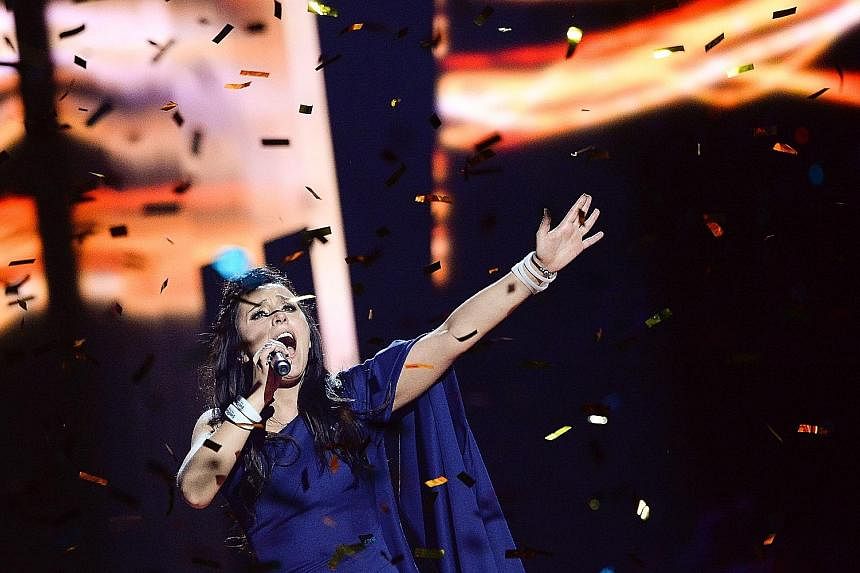 Ukrainian singer Jamala was declared winner after a tense vote count.