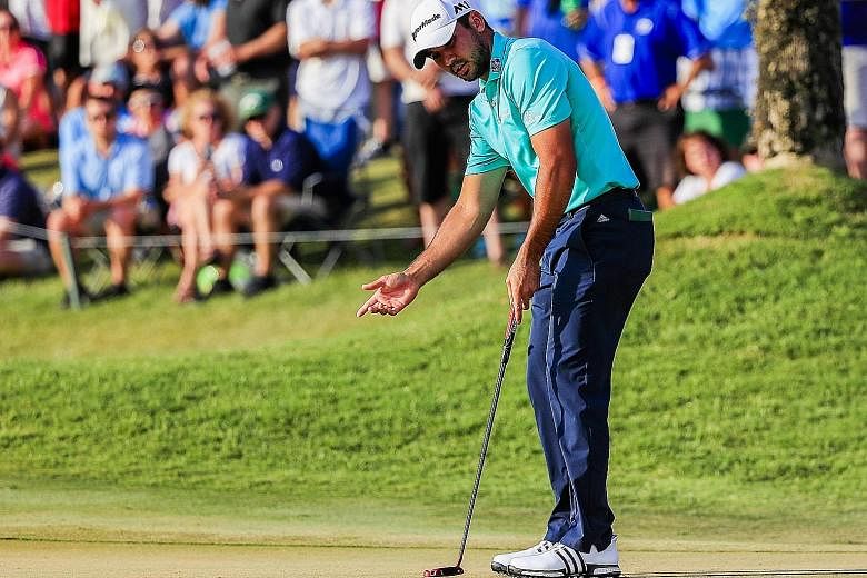 Australian world No. 1 Jason Day gesturing after missing an eagle putt on the 16th green during the third round. Despite a 73, he still held a four-shot lead heading into yesterday's final round.