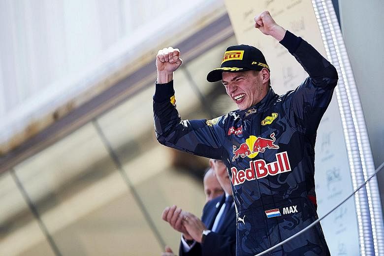 Red Bull's debutant Max Verstappen basking in the adulation of the crowd at the Catalunya circuit after winning the Spanish Grand Prix. The 18-year-old had just been promoted from Toro Rosso to replace Daniil Kvyat, who was dropped after an awful dri