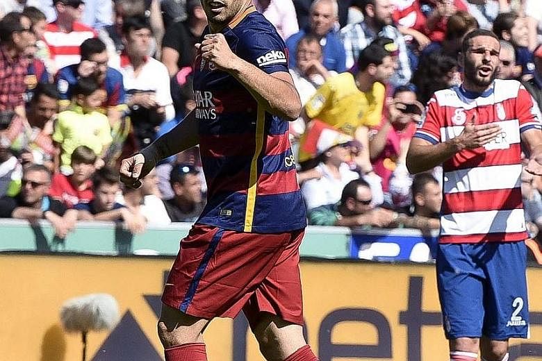 Barcelona manager Luis Enrique has lauded his striker Luis Suarez (left) for bringing more than goals to the team.