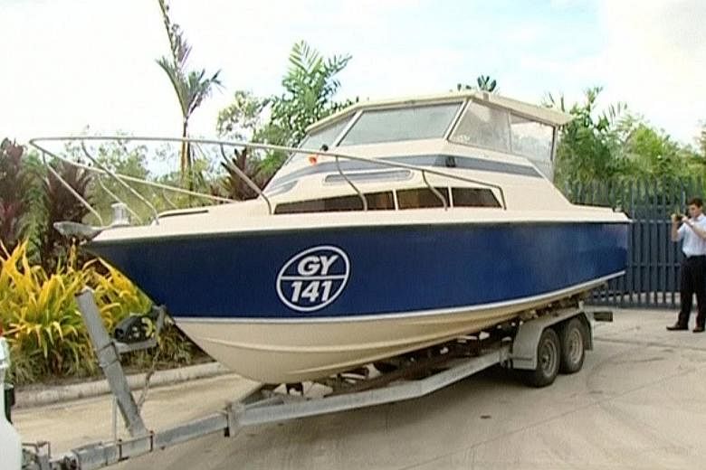 The small motorboat seized by the police in Cairns. The interior is pictured below. The five men were arrested last Tuesday after having towed the boat almost 3,000km from Melbourne to Cairns.