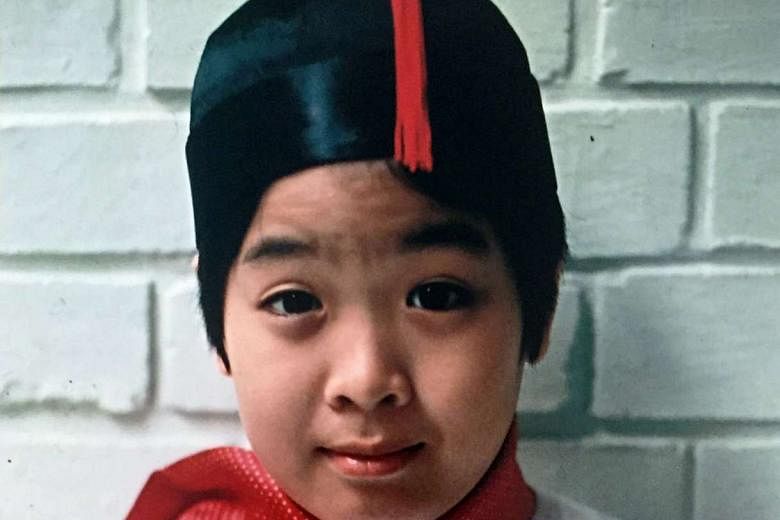 My Life So Far: Peter Lee dressed for Chinese New Year in 1975. His mother forced him to wear this costume, which she thought was cute. 
