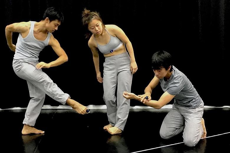 Dancers (above from left) Matthew Goh, Melyn Chow and Kong Wei Jie.