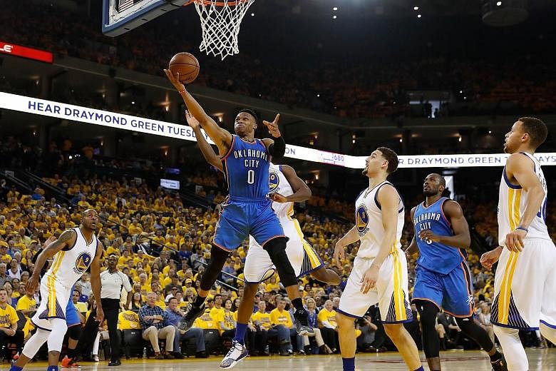 Thunder guard Russell Westbrook going up for a shot against the Golden State Warriors during Monday's game.
