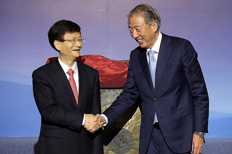 Chinese delegation leader Meng Jianzhu meeting Deputy Prime Minister Teo Chee Hean yesterday. The two leaders discussed the challenges facing Singapore and China in social governance.