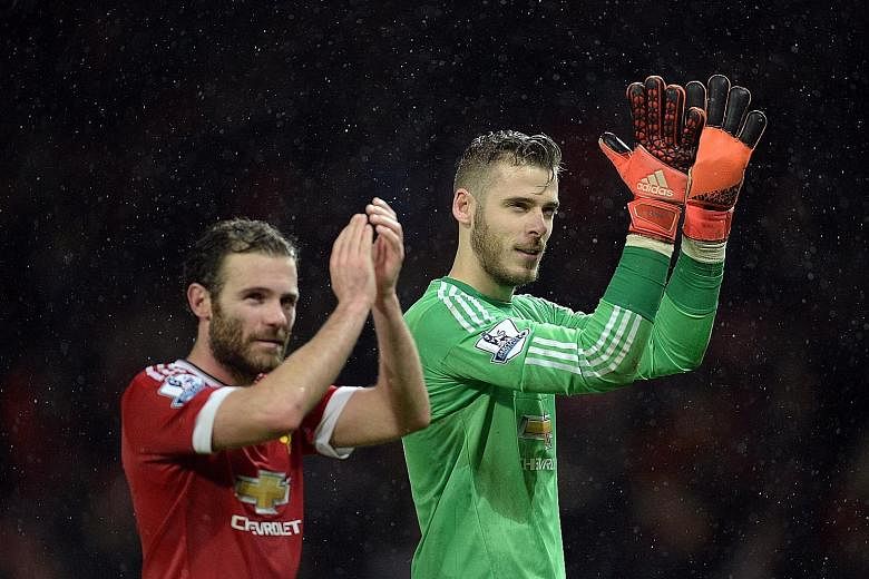 United's under-par season has seen Juan Mata (left) of Spain join France's Morgan Schneiderlin and England's Michael Carrick (England) as Euro 2016 absentees. But goalkeeper David de Gea (right) will be in France with the defending champions after an
