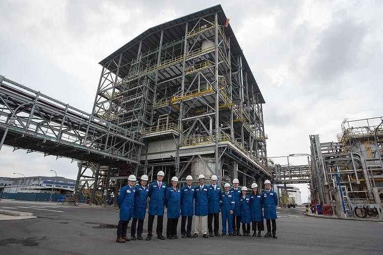 Afton Chemical Corporation staff at the newly-built manufacturing plant on Jurong Island. The plant is central to the US firm's plans for expansion in the Asia-Pacific, said company president Rob Shama.
