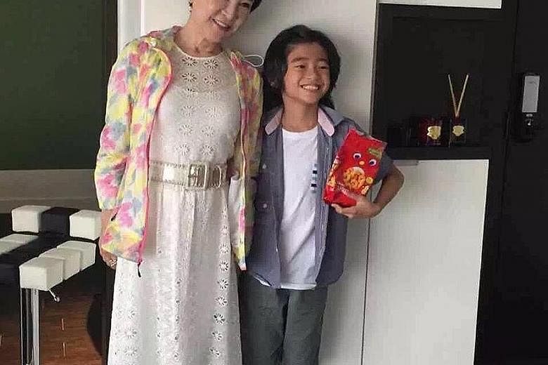Cecilia Cheung's manager posted photos of Deborah Li visiting her grandsons Quintus (right) and Lucas after a Hong Kong producer complained that Cheung has denied her in-laws access to her sons.