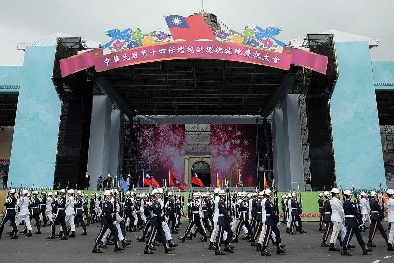 Honour guards rehearsing in front of the Presidential Palace in Taipei yesterday, ahead of Ms Tsai's inauguration tomorrow. The economy is likely to rank high on Ms Tsai's to-do list.