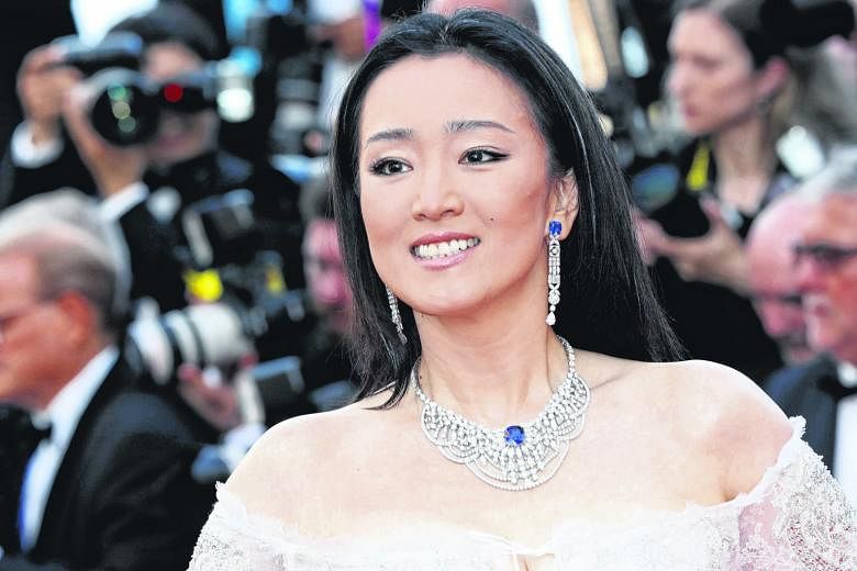 Chinese actress Gong Li with flawless skin at the Cannes Film Festival.