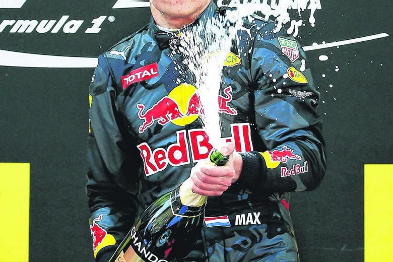 A gleeful Max Verstappen atop the Circuit de Catalunya podium, after becoming F1's youngest race winner by clinching last Sunday's Spanish Grand Prix.