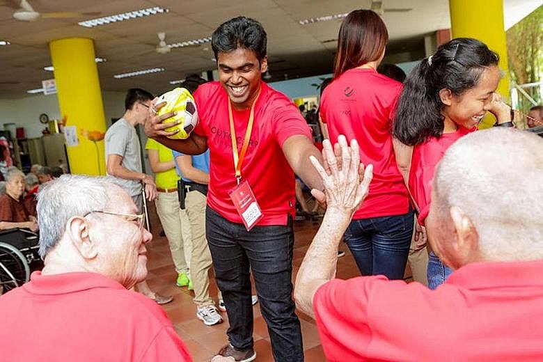 Onelyst's Mr Abbas (above) at a Youth Corps Singapore event. His business came about because he was exploring ideas for a start-up that could make a difference, and he knew something could be done to improve access to financial information for low-in
