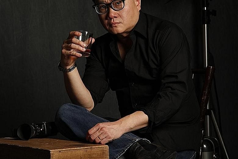 Film-maker Eric Khoo (above) chose Chua Mia Tee's Portable Cinema (left) as the basis of his short film.