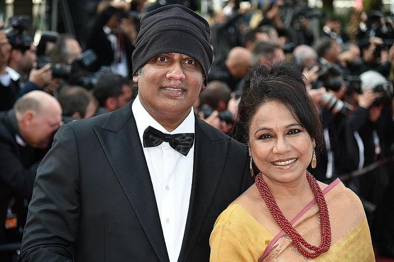 Singaporean director K. Rajagopal (with Indian actress Seema Biswas) at the Cannes Film Festival, where his movie, A Yellow Bird, premiered on Wednesday.