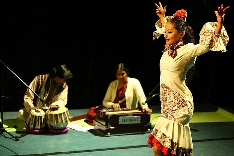 Dancers from Flamenco Sin Fronteras. Chinese flamenco dancer Zhen Zhao performing with Indian musicians.