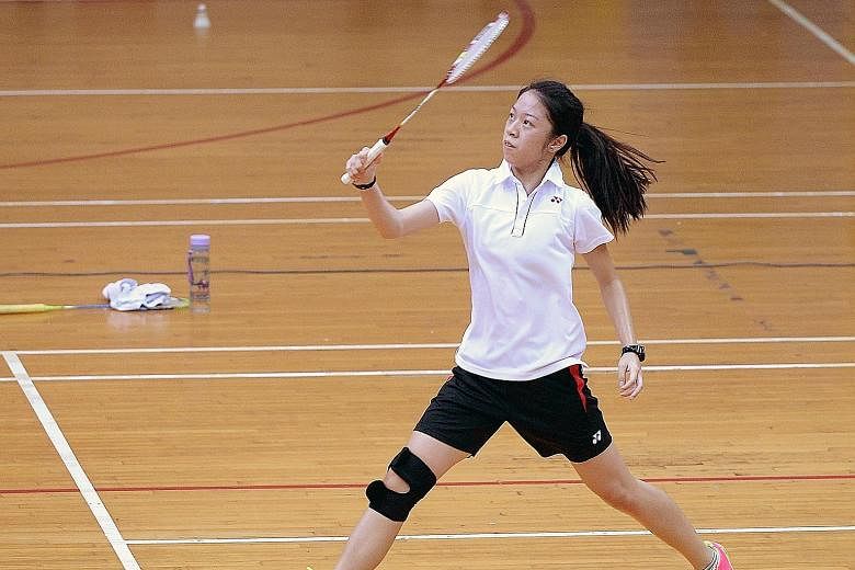 Raffles Institution captain Chung Shiqi during her 21-14, 21-8 rout of River Valley High School's Cheong Yi Hua. The result gave her team a good start and they went on to win 4-1.