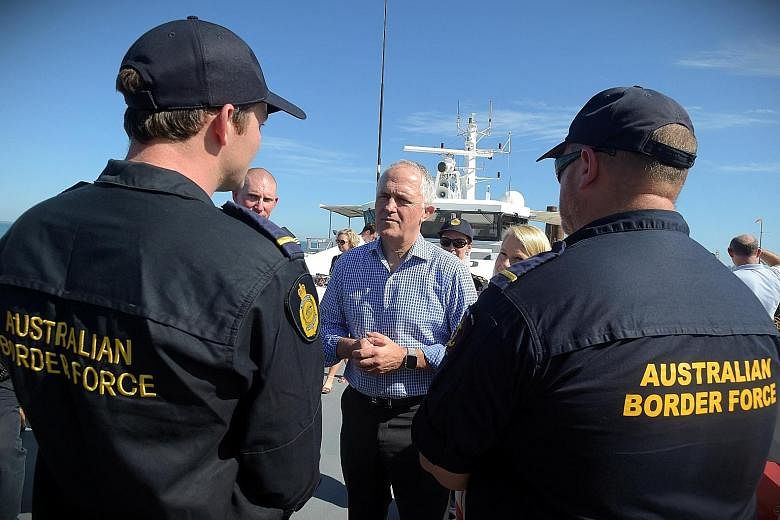 Mr Turnbull speaking to Border Force officers on Tuesday. The issue of Pacific detention camps for asylum-seekers has been a growing problem for the Prime Minister.