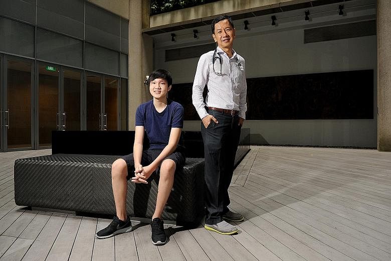 Joel with his doctor, Associate Professor Allen Yeoh from the National University Cancer Institute.