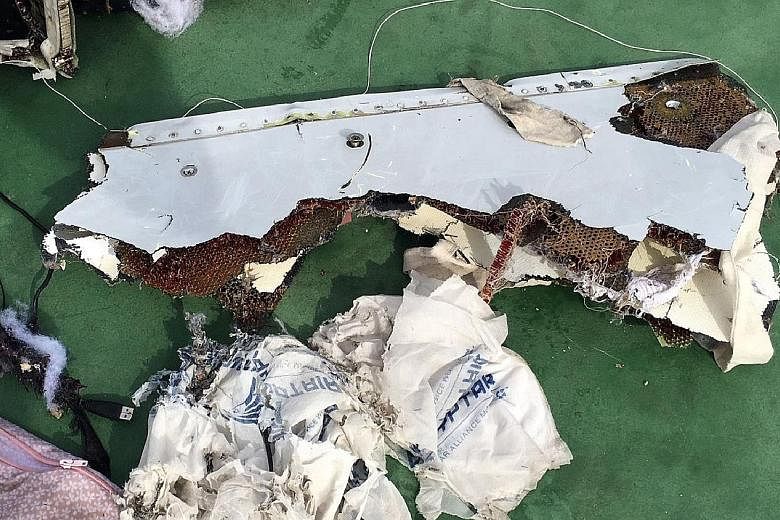 An Egyptian army spokesman published pictures of some of the wreckage recovered so far, including a safety vest and what appears to be the shredded remains of a seat, on its official Facebook page. Analysis of the debris is likely to be key to determ