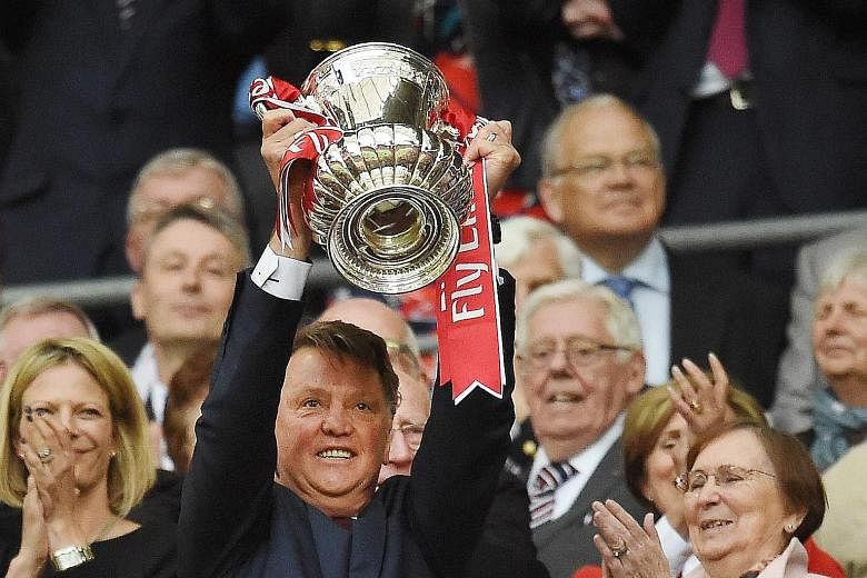 Above: Manchester United manager Louis van Gaal may have led his side to the FA Cup but failure to qualify for next season's Champions League may ultimately cost him his job. Right: Van Gaal's legacy may yet live on in the form of the youngsters he b